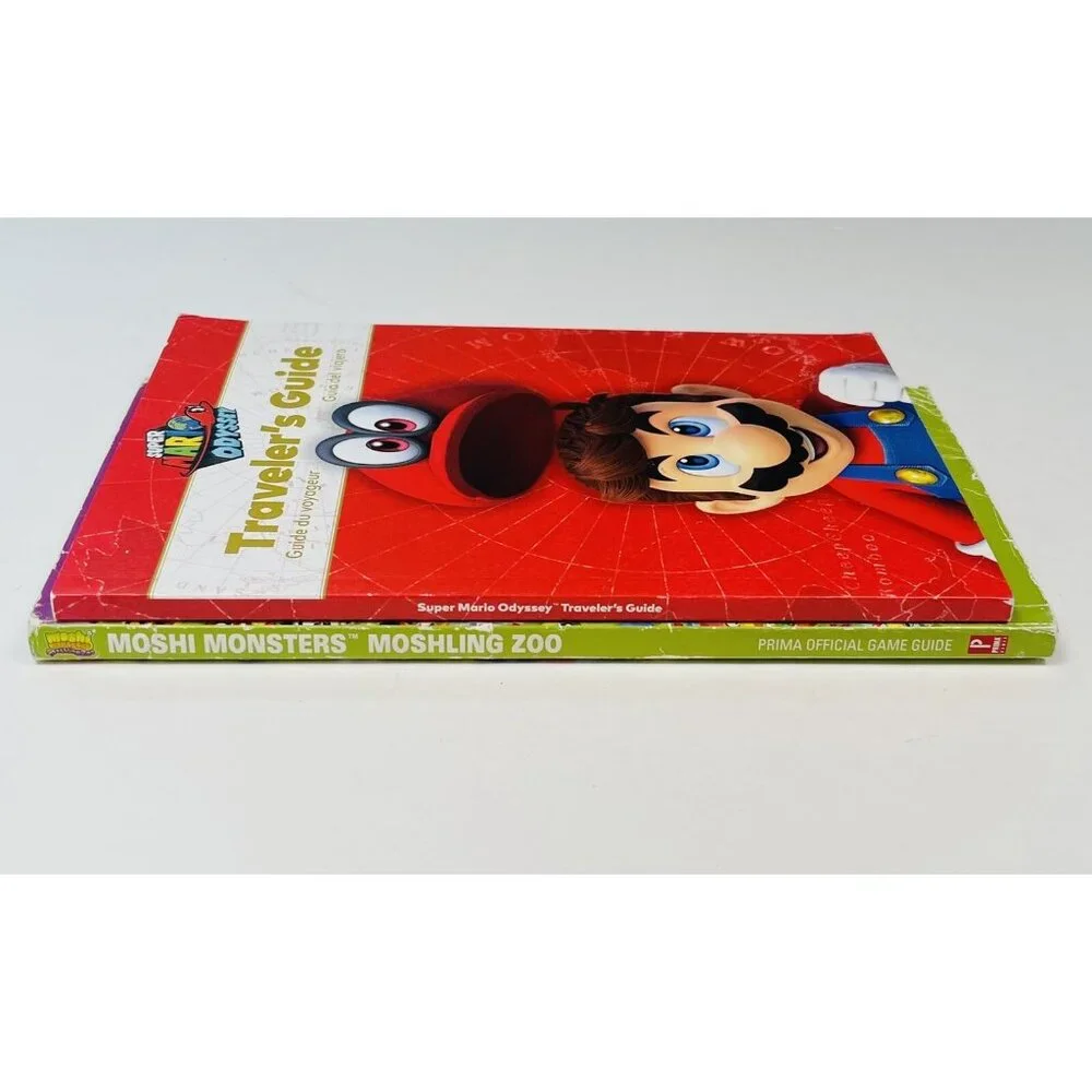 Lot 2 Nintendo DS GAME GUIDE Books Super Mario Odyssey & Moshi Monsters Moshling